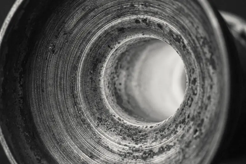 Looking into a heat-darkened engine nozzle glowing at its throat